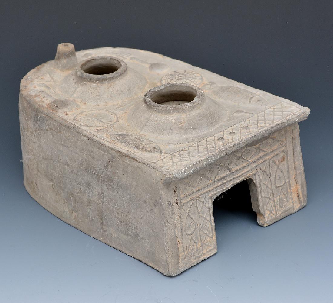 Chinese pottery burial model stove, Han Dynasty: Chinese pottery burial piece, model of a stove, Han Dynasty, appx 4" x 8".
