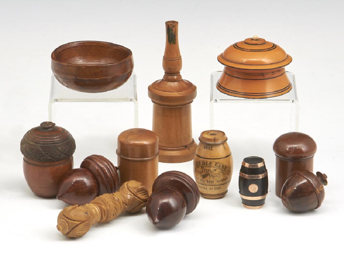 Group of 12 treen items: Group of 12 treen items including acorn shaped boxes, 2 portable inkwells, needle cases and a needle dispenser, powder dispenser, etc. Tallest appx 5". Good condition.