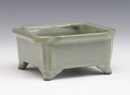 Chinese lungquan guan-type brushwasher: Chinese lungquan guan-type brushwasher. Of elegant square sides with wide everted rim set with indented corners, and supported on four bracket foot, covered all over with a lustrous olive green glaze