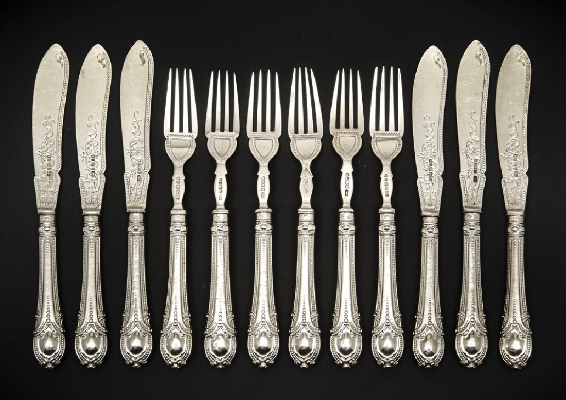Set of sterling flatware: 6 forks, 6 knives (1 of 2)