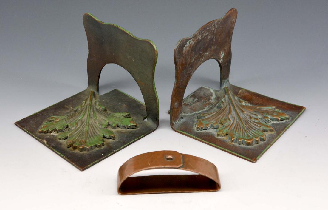 Pair of Jauchens bookends and Roycroft napkin ring (1 of 1)