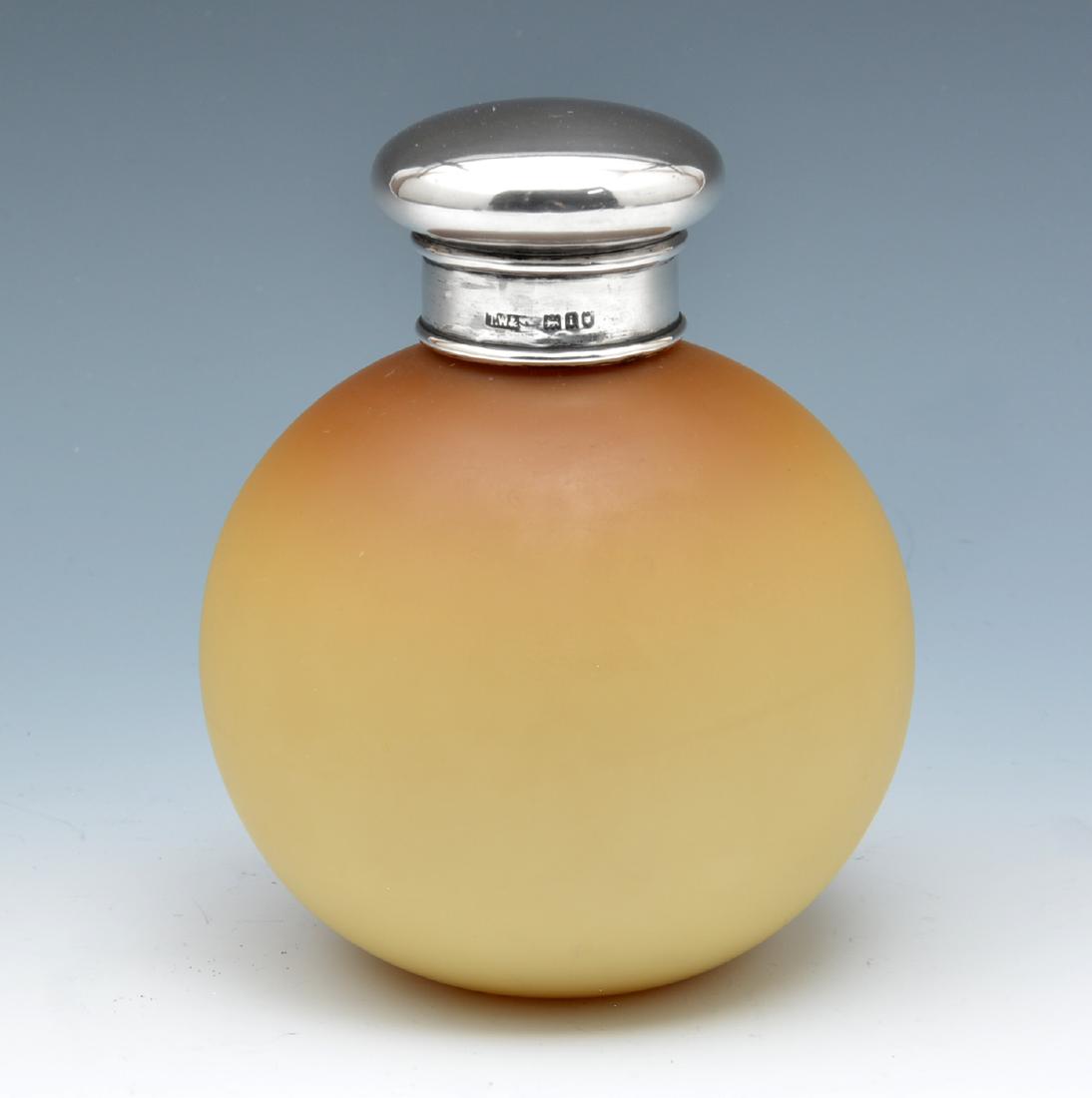 Thomas Webb peach blow brown-to-cream perfume bottle: Thomas Webb peach blow brown-to-cream perfume bottle. The lid marked for English sterling silver. Measures appx 4 1/4" t. Bottle apparently unmarked. In good condition.