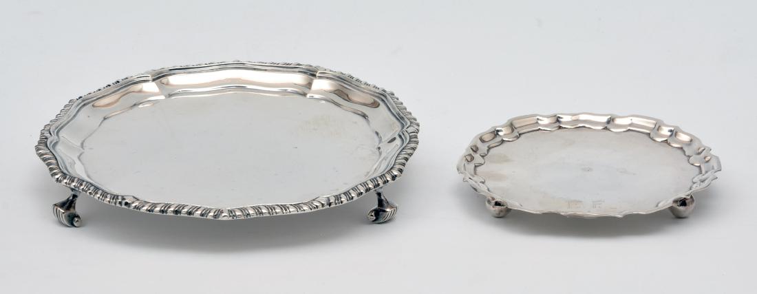 Two English sterling silver footed salvers: Two English sterling silver footed salvers. The smaller by Roberts & Belk Ltd, the larger by C.S. Harris & Sons. Measure appx 6 1/4" and 4 1/4" w, weighs appx 9.5 ozt total.