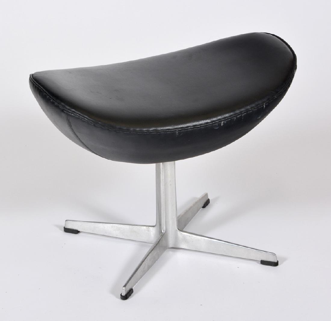 Arne Jacobsen for Fritz Hansen Ottoman: Arne Jacobsen for Fritz Hansen Ottoman. C 1960's. Marked at base. Edge ware to cushion. Measures appx 16" t x 21" w x 15 1/2" d.