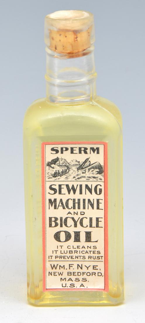 Bottle with "Nye Sperm Oil", unopened. 5" tall (1 of 3)