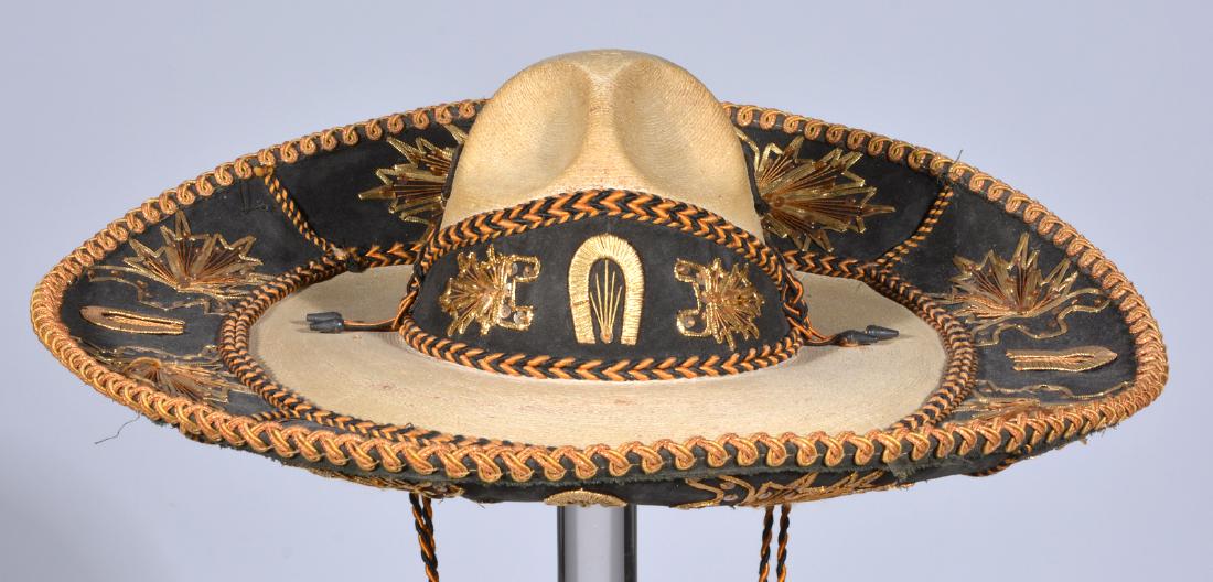 Vintage Sombrero by Calidad from La Barca restaurant: Vintage Sombrero by Calidad from La Barca Mexican restaurant, San Francisco, California. Ornately decorated hand woven 2 sided brim. Lined and signed in cap. 22" diameter. Good condition.