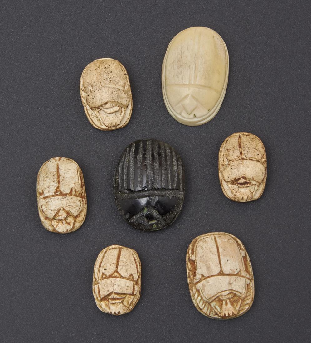 Grouping of 7 Egyptian scarabs, faience and stone (1 of 2)
