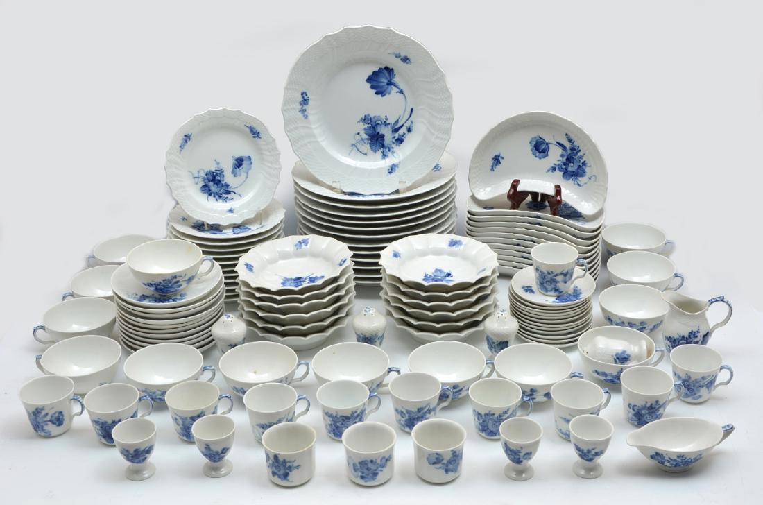 Royal Copenhagen Blue & White Dinnerware, appx, 135 pcs: Royal Copenhagen Blue and White Floral Dinnerware. Appx. 135 pieces decorated with a cobalt blue floral pattern over bone white ground. To include: 13 fluted dinner plates, 12 crescent salad plates, 1