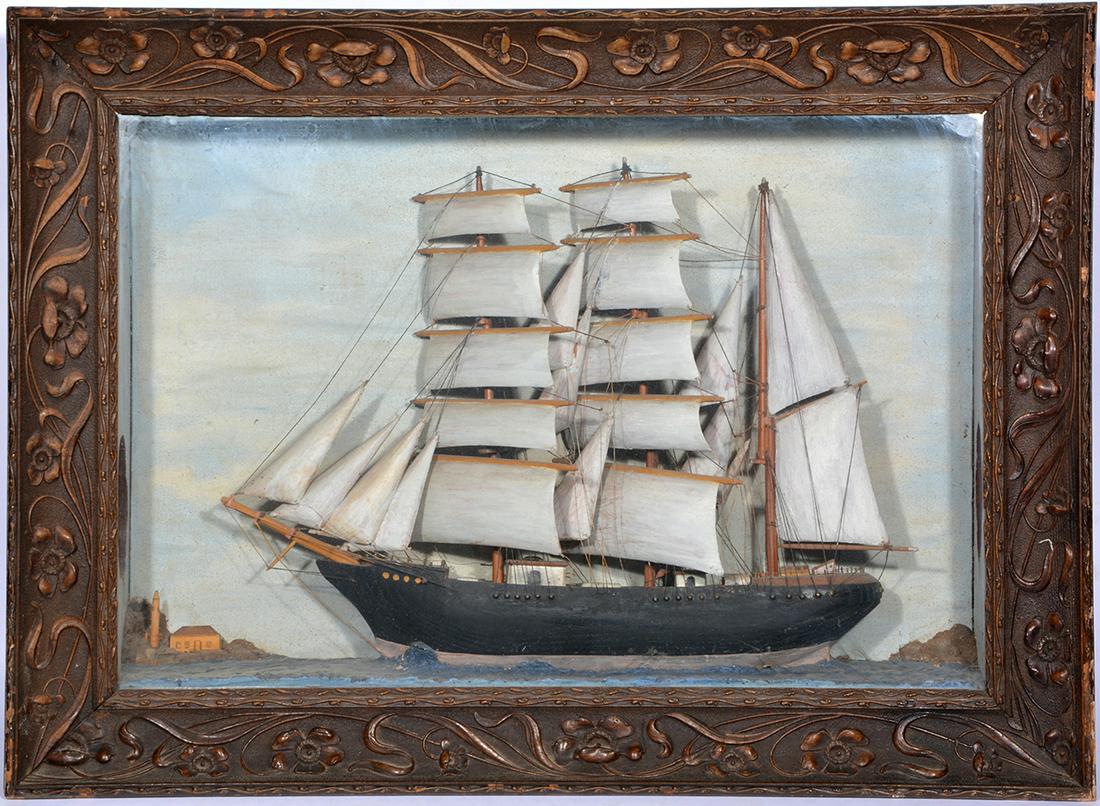 Shadowbox Ship Model, 19th c., Schooner under full sail: Shadowbox Ship Model, 19th c., Schooner under full sail with lighthouse and building at left. Carved wooden sails. Art Nouveau frame: 22"t x 30"w x 6"d. Very Good condition.