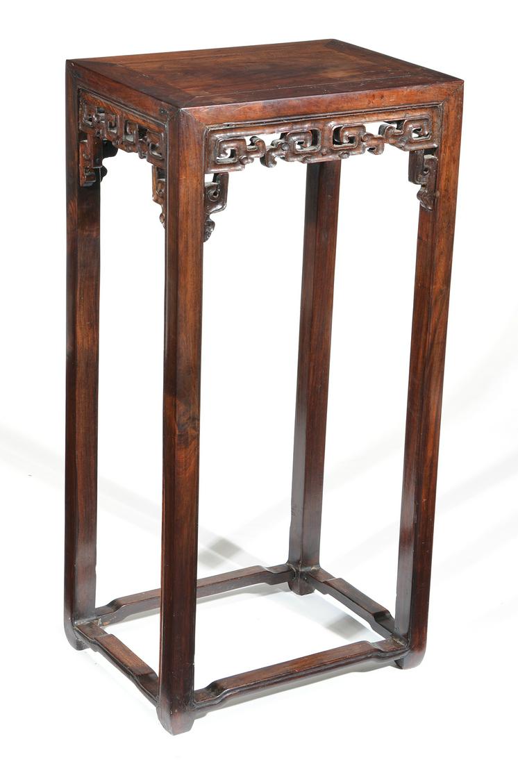 Tall Chinese Rosewood Stand with openwork carved skirt. (1 of 3)