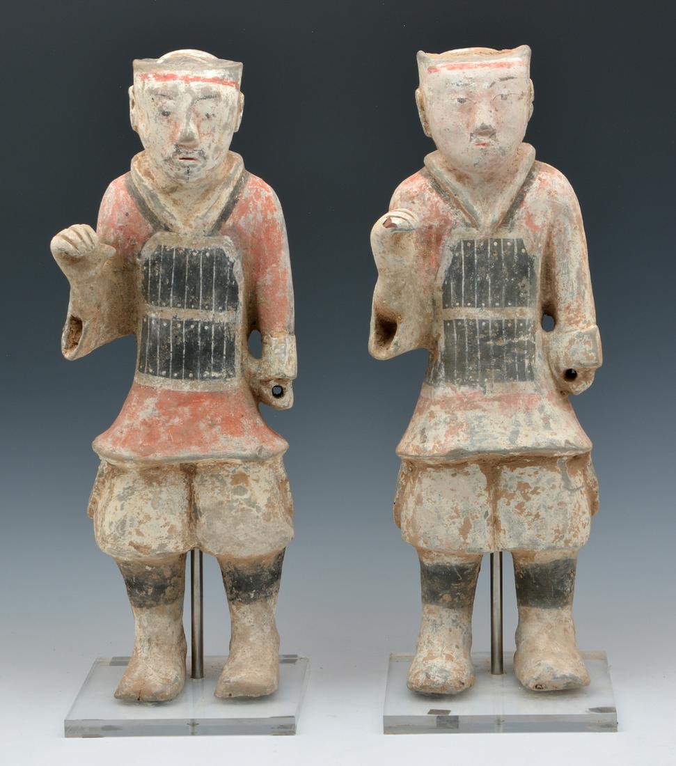 Pair of Chinese Terracotta Warriors or Foot Soldiers: Pair of Chinese Terracotta Warriors or Foot Soldiers, possibly Han. Old paint & lacking spears. 20" and 20 1/4" tall.
