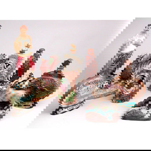 Lot Eight Figural Liquor Bottles: LIQUOR BOTTLES. Lot of eight figural liquor bottles, consisting of two Cyrus Noble, three Jim Beams, Yukon Jack, Wild Turkey, and a Ezra Brooks. 1970's. Tallest 16" x 7" x 4". Very good original condi