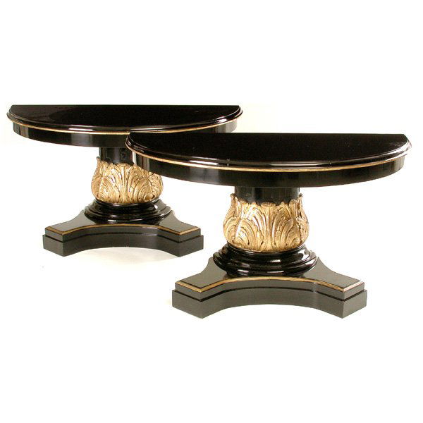 Two Ebony Consoles / One Round Center Table, 20th.: TABLES. Two bold ebony consoles that join to make a single round center table, the black tops are trimmed in gold and set atop a heavy column and pedestal base accentuated with gilt acanthus leaves, 2