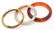 2 Chinese Jade Bangles and 1 Amber Bangle.