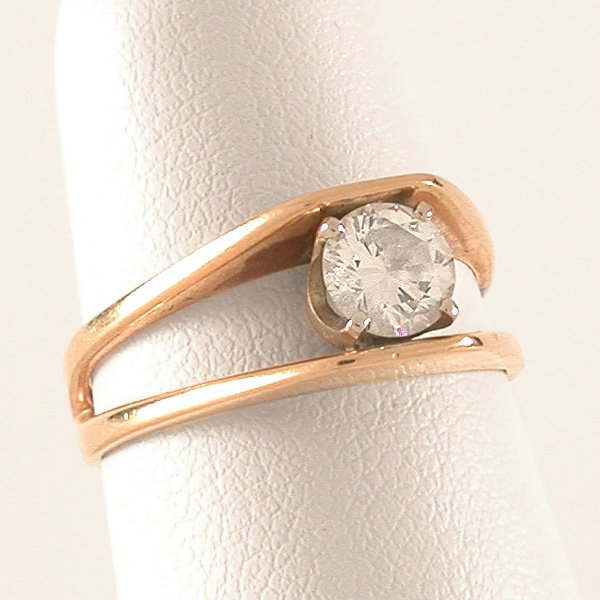 14 Karat Gold Diamond Solitaire Ring