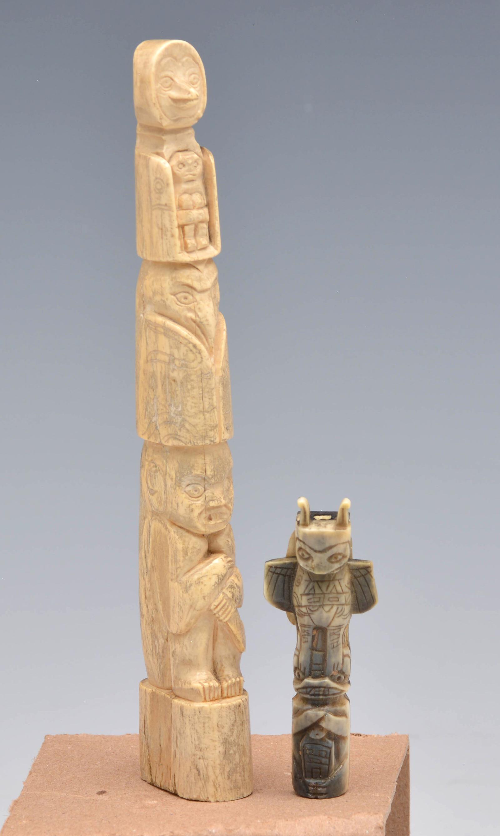 Two Eskimo Totem Poles.: Two Eskimo Totem Poles. Bone 5 1/2"t and Horn 2 1/4" t. Very good condition