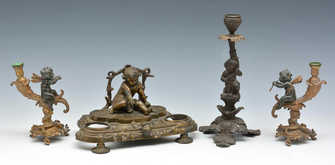 Grouping of 4 Metal Putti Figures (1 of 2)