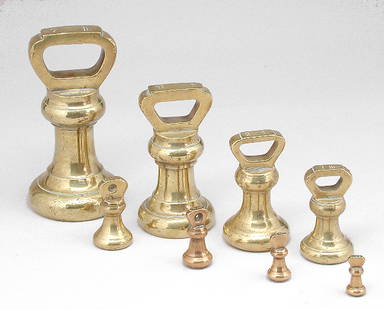 Set of Victorian Brass Weights: WEIGHTS. Graduated set of 8 Victorian brass weights ranging from 1 oz. to 7 lbs., 1.25" to 7" Very good original condition