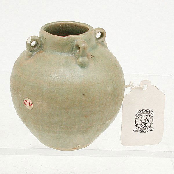 Sukhothai Southeast Asian Celadon Vase 14th. 16th.: VASE. Small Sukhothai ceramic celadon vase in jug form with four handles, 14th. to 16th. century, good condition, minor glaze loss, 1 repair, bearing June 1984 Christies Tags or Stickers, 3" dia 3.25"