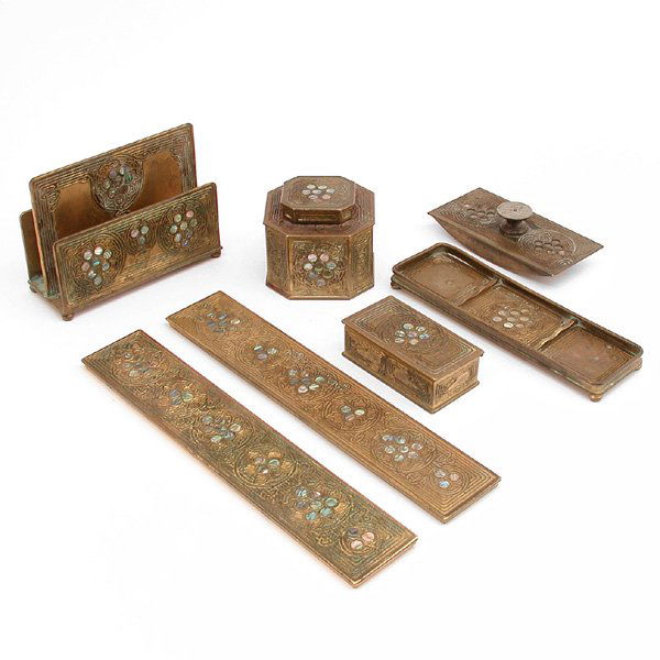 Tiffany 7 Piece Desk Set, Abalone Pattern: DESK SET. Tiffany Studios, New York seven piece desk set in the Abalone pattern, consisting of: stamp box, pen tray, inkwell, paper rack, blotter ends and rocker blotter, each fashioned with framing l