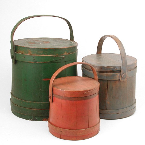 Stack Of 3 American Bentwood Pantry Boxes: BOXES. Stack of American wood pantry boxes; three circular of ascending size with stove sides and bentwood banding, red, slate blue and green, good condition, largest 15" w x 14 3/8" t.