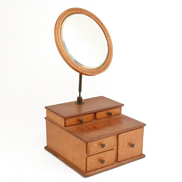 19th. C Bird's Eye Maple Shaving Mirror: SHAVING MIRROR. Attractive 19th. century bird's eye maple shaving mirror with beautiful markings, the beveled mirror is adjustable and set above storage drawers, very good condition, 10 5/8" w x 11 1/