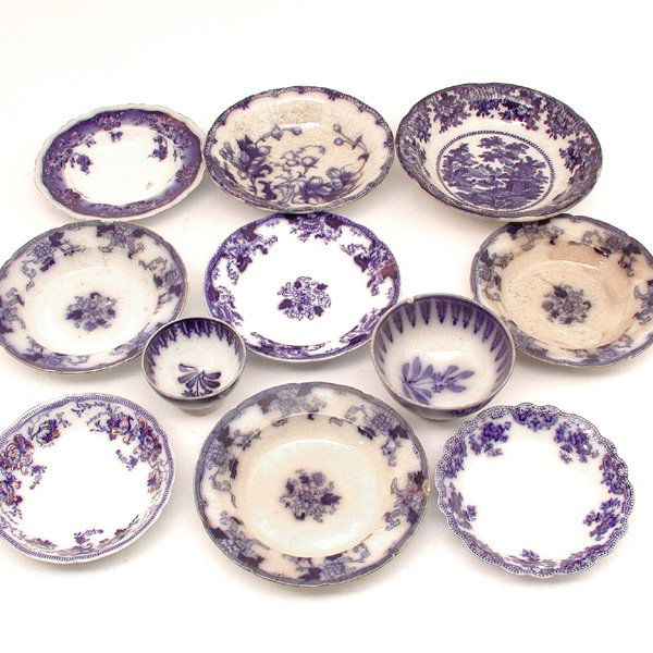 Lot Of 11 Flow Blue Porcelain Bowls: PORCELAIN. Lot of eleven flow blue porcelain bowls with various floral and landscape patterns, good condition, losses, largest 10 1/4" w.