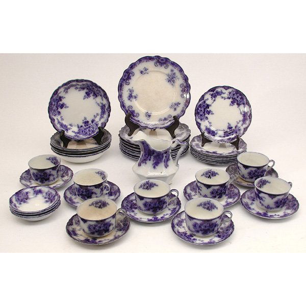 45 Pc. Flow Blue Porcelain Lunch Set, Devon: PORCELAIN. Forty Five piece flow blue porcelain luncheon set in the Devon pattern, floral decoration, ten luncheon plates, eight each; cups, saucers, dessert plates, six bowls, four fruit bowls, one c