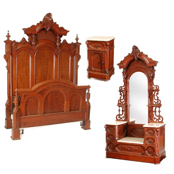 19th. C. Victorian Walnut Bedroom Set: BEDROOM SET. 19th. century Victorian walnut bedroom set consisting of; bed frame, (a double), the headboard formed of three coffered arches with a carved cartouche surmounting them, next is a drop cen
