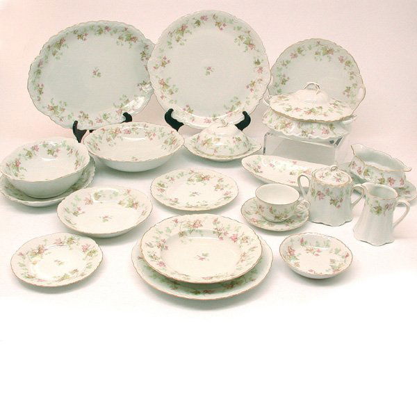 145 Pc. Hutchenreuther Red Maple Dinner Service: DINNERWARE. One hundred and forty five piece Hutchenreuther, Red Maple Leaf porcelain dinner ware, consisting of, eighteen saucers, fifteen cups, fourteen each; dinner plates, salad plates, bread plat