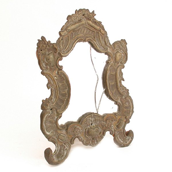 Louis XV Style Brass Repousse Table Mirror: MIRROR. Louis XV style dresser mirror with brass repousse frame on wooden back, early 19th. century, frame, good condition, mirror cracked, 13 1/2" x 11 1/2".