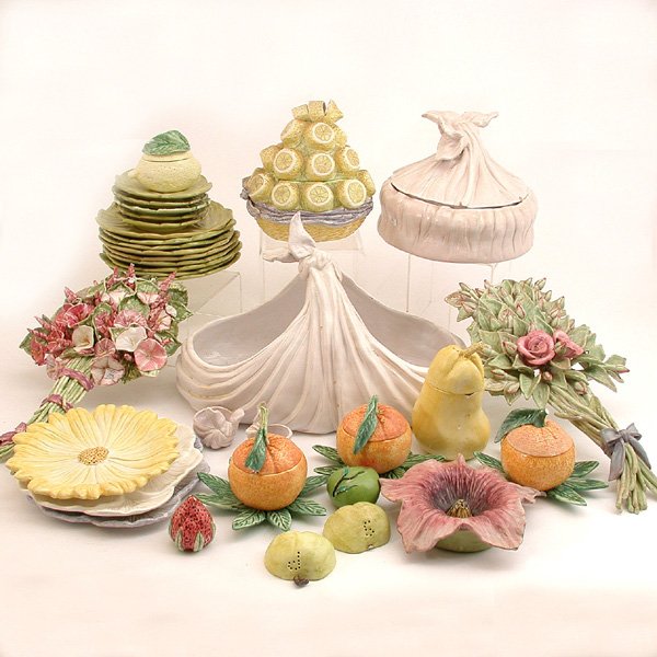Lot of Italian Table Ware, by Annie de Garon: CERAMICS. Lot of 34 pieces of Italian ceramic table ware by Annie de Garon, consisting of linen form covered casserole; double bowl & 2 salts, set of 14 cabbage leaf plates in two sizes; two flower pl