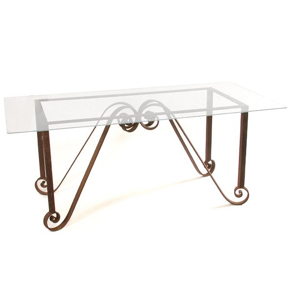 Continental Iron Dining Table, Glass Top: TABLE. Continental iron dining table with glass top, straight legs ending in scrolls which rise inward to the center top of the table where the four scrolls are joined, good condition, patina, table b