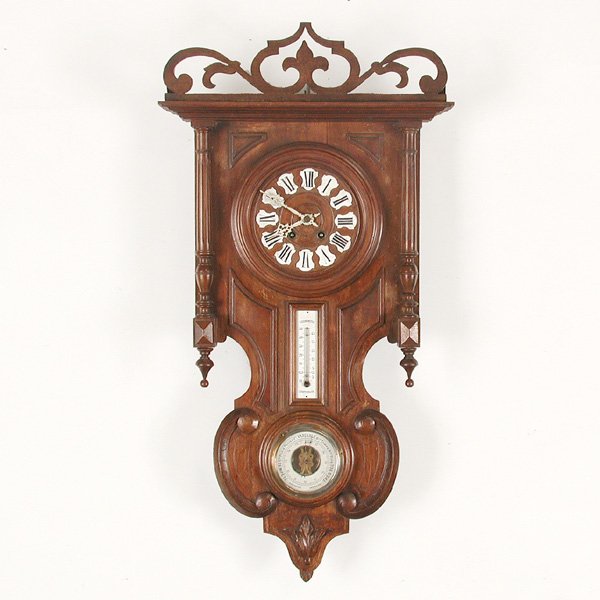 French Walnut Barometer Clock.: CLOCK. French Wall Clock with Barometer and Thermometer Circa 1880. 8 day time and strike movement having enameled Roman numerals, 33"h, wear to finish, in good overall condition.