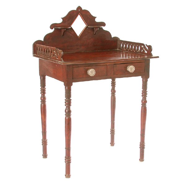 Sheraton Mahogany Entry Table: TABLE. American Sheraton mahogany entry table, circa 1810 with pine secondary wood, unusual mirrored gallery with fretwork sides ending in whale tails, two frieze drawers with Sandwich Glass pulls, ri
