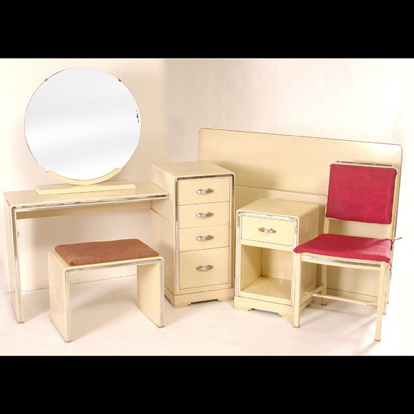 Norman Bel Geddes Bedroom Set: BEDROOM SET. 1940's Norman Bel Geddes for Simmons enameled metal bedroom set in beige and chrome, consisting of full size bed, vanity, mirror, side chair and side stand, some scuffs and scratches, in 