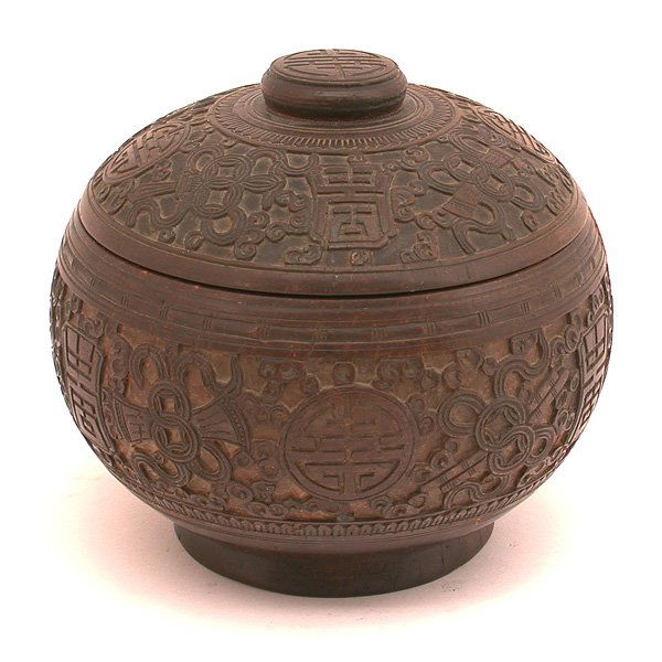 Carved Chinese Coconut Lidded Bowl: COCONUT BOWL. Chinese lidded and footed bowl carved from a coconut, with fine carving throughout, the interior branded with 'fu' the Chinese character for good fortune, 4 1/2"h x 5"d, overall in good