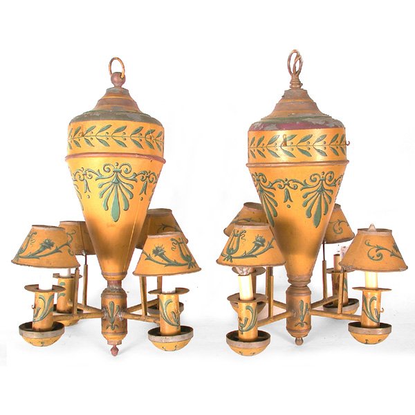 Pair of French Tole Hanging Lanterns: LANTERNS. Pair of French mustard paint tole 4-light gravity fed lanterns (electrified), having green decoration of lyre and foliate, 20"h x 14 1/2"d, some paint loss in areas, one shade detached.