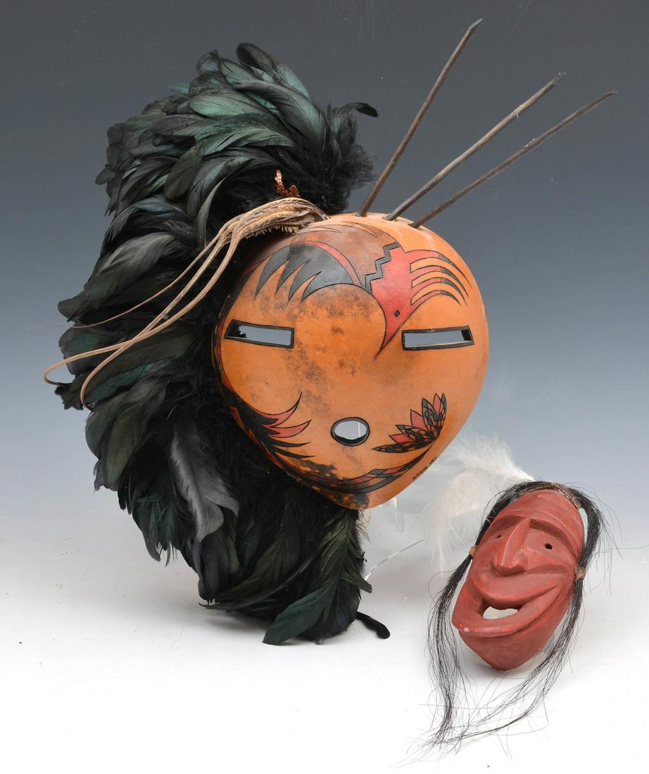 2 Native American masks, "N. Oziat" (1 of 2)