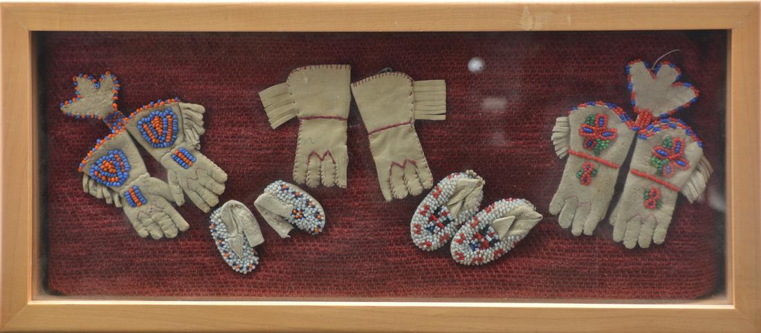 Native American miniature moccasins and glove diorama: Native American miniature moccasins and glove diorama. Diorama measures: 7" x 15 1/2".