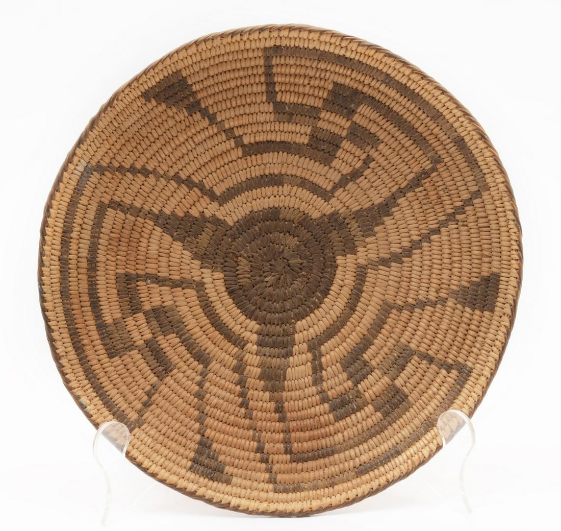 Pima North American antique basketry tray: Pima North American antique basketry tray with wheel design, appx. 11 3/4" diameter.