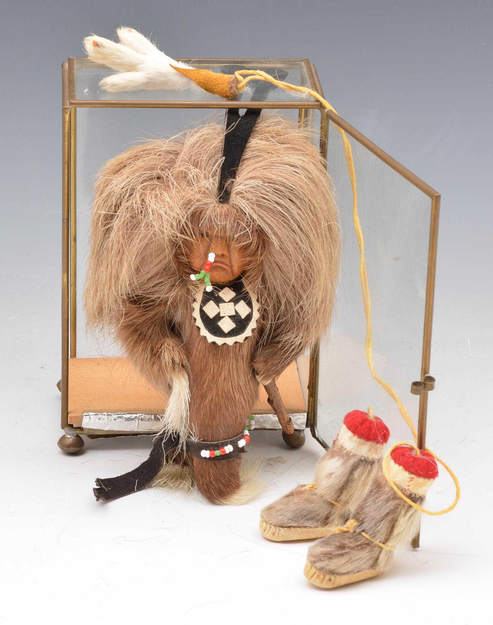 Eskimo Native American fur covered warrior: Eskimo Native American fur covered warrior, cased, 7" tall + boots.