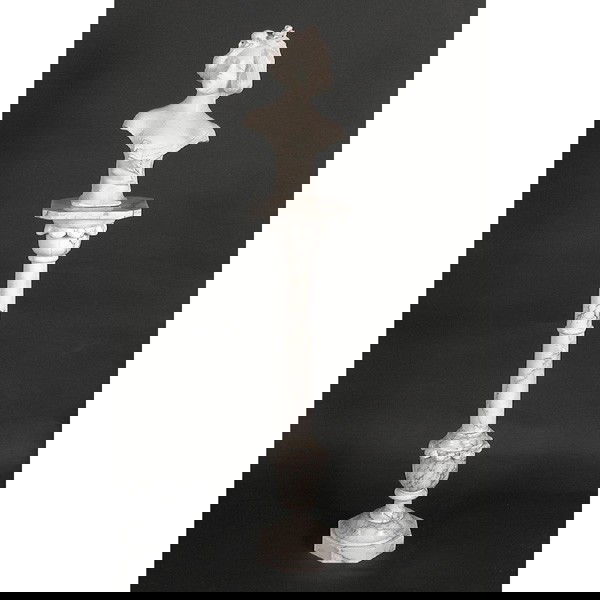 Carved Alabaster Bust On Marble Pedestal: MARBLE BUST. Carved white alabaster bust featuring a Victorian beauty, florally accented and on a variegated grey marble pedestal, bust size 17 1/2"h x 9"w x 9"d, pedestal 36 1/2"h, overall in good co