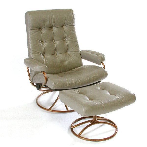 Ekornes Modern Scandinavian Armchair and Ottoman: ARMCHAIR. Ekornes modern Norwegian design armchair and ottoman, in grey tufted upholstery, with metal bases in a copper finish, chair 40"h x 33"w x 31"d, in good condition.