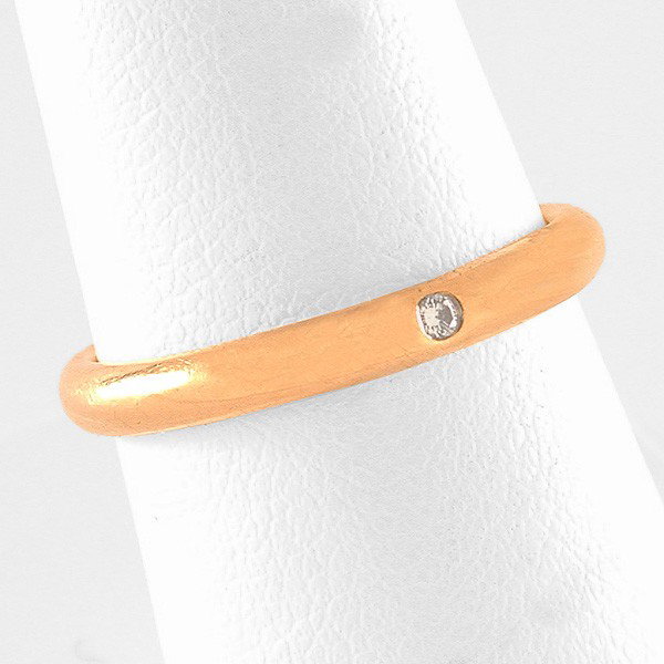 Tiffany & Co. Peretti Gold & Diamond Ring: RING. Stamped "750 Peretti Tiffany & Co." gold band with flush set .02 diamond, 3mm, size 8.25.