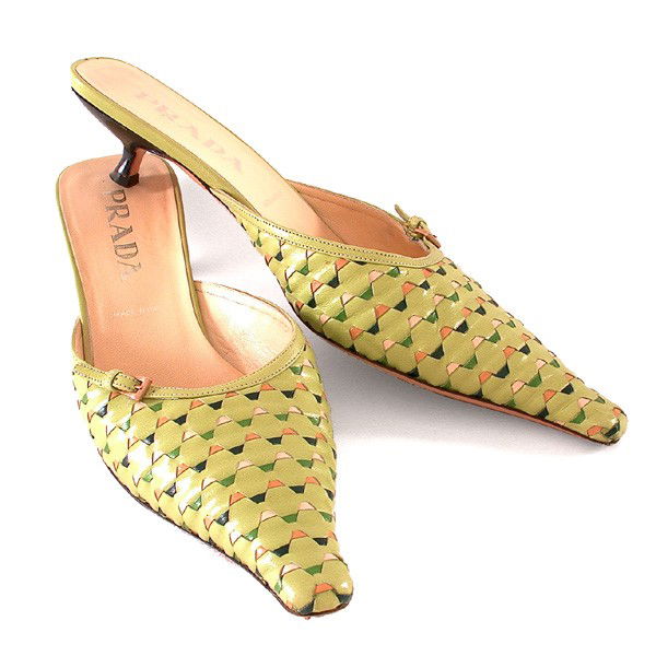 Lady's Prada "Kitten Heel" Shoes: SHOES. Lady's Prada "kitten heel" shoes, woven leather including colors of green, blue and pink. Strap accent with silver buckle, size 39.