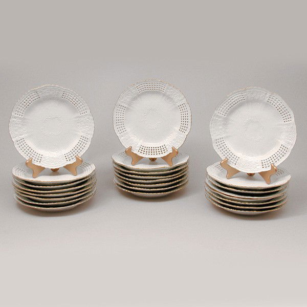 24 German Meissen Porcelain Dinner Plates: PLATES. 24 German Meissen dinner plates, white basketweave design fields with gilt rim, late 19th century, 9 1/2" across, blue cross sword mark.