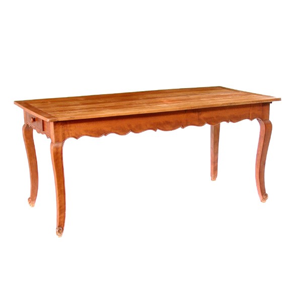 French Dining Table, 19th Century: TABLE. 19th century French Table with cutlery drawer on one end and bread board pull out on the other. Simple shaped skirt and legs ending in upward carved curls, peg construction, 30"T by 67"W by 33"