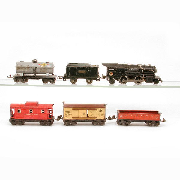 Lionel No. 259e, 654, 655, 652, 657: TRAIN. Lionel train set including: Ste+T G 259e, Tank (Gray Heavily Scratched) 654, Boxcar 655, Gondola 652, Caboose 657.