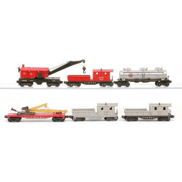 Lionel No. 6560, 6119(2), 6660, 6425: TRAIN CARS. Lionel train cars including: Crane Car 6560, Caboose Red And Black 6119, Gray Work Caboose 6119, Boom Car 6660, Tank Car 6425.